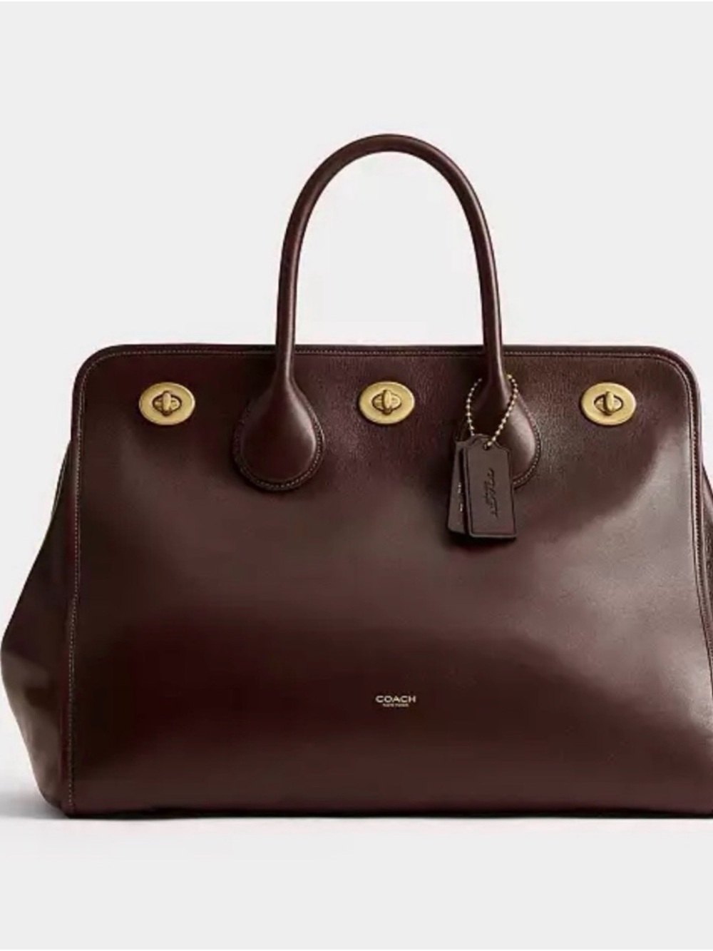 Coach Turnlock 40 Maple- NWT